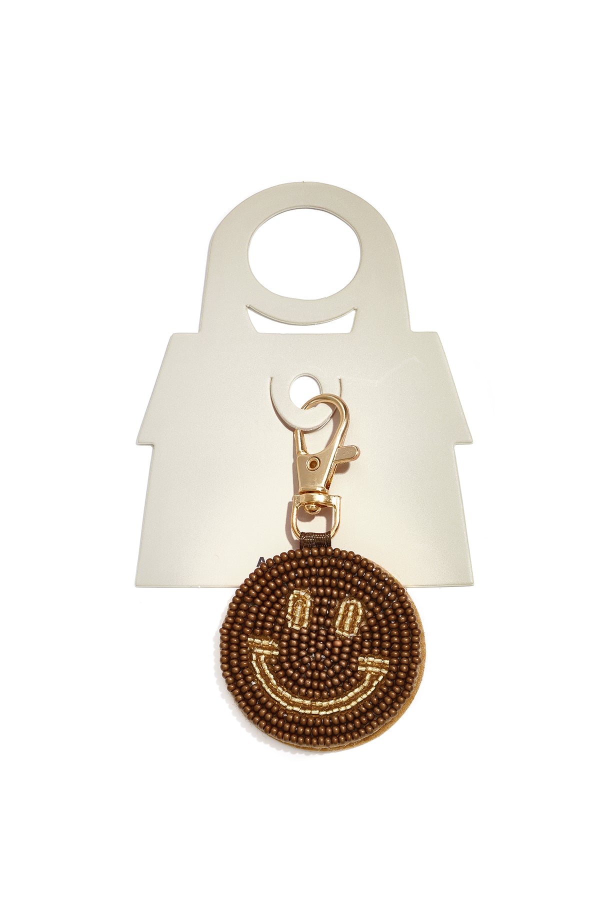Tasbedeltjes met een lachend gezichtje, casual glazen accessoires voor dagelijks gebruik.